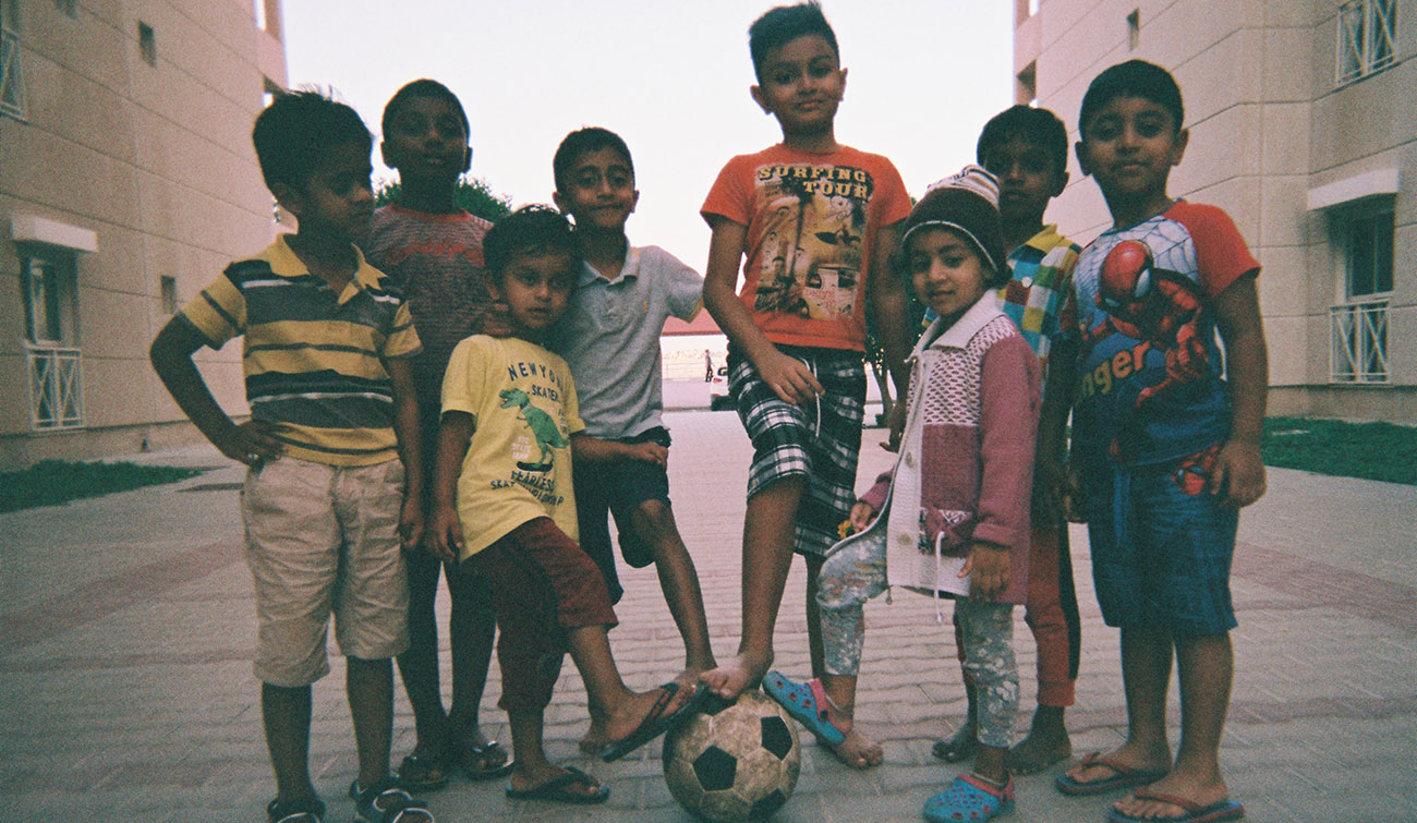 At Barwa City: kids play football everywhere