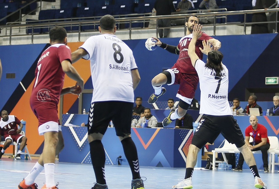 Defending champions Qatar's handball team