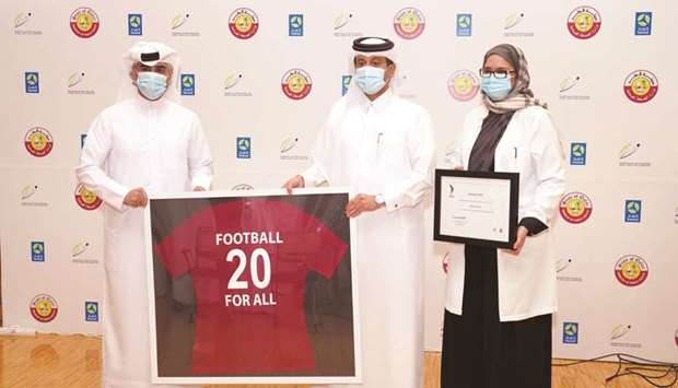 QFA presents Football for All Award to MoPH