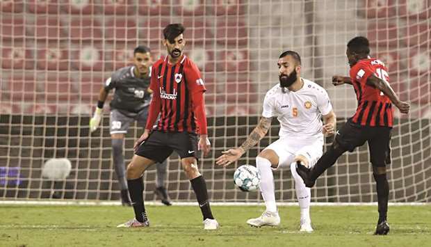 Action from the Ooredoo Cup match between Al Rayyan and Umm Salal at the Al Arabi Stadium yesterday.