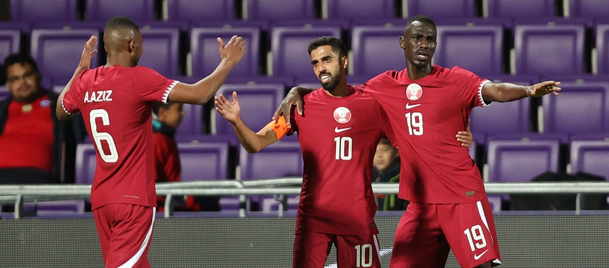 Qatar fight back to draw with Chile