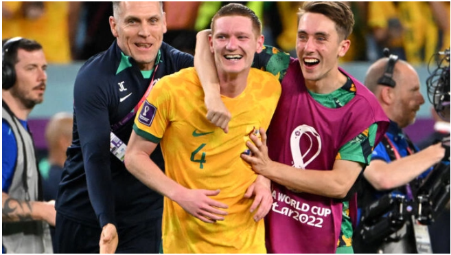 Australia beat Denmark to reach knockouts