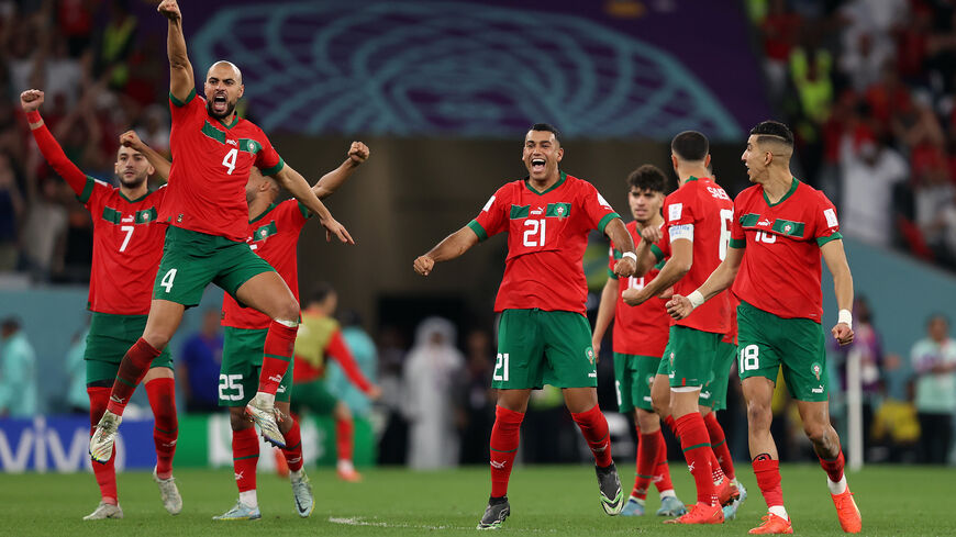 Morocco players celebrate after their win