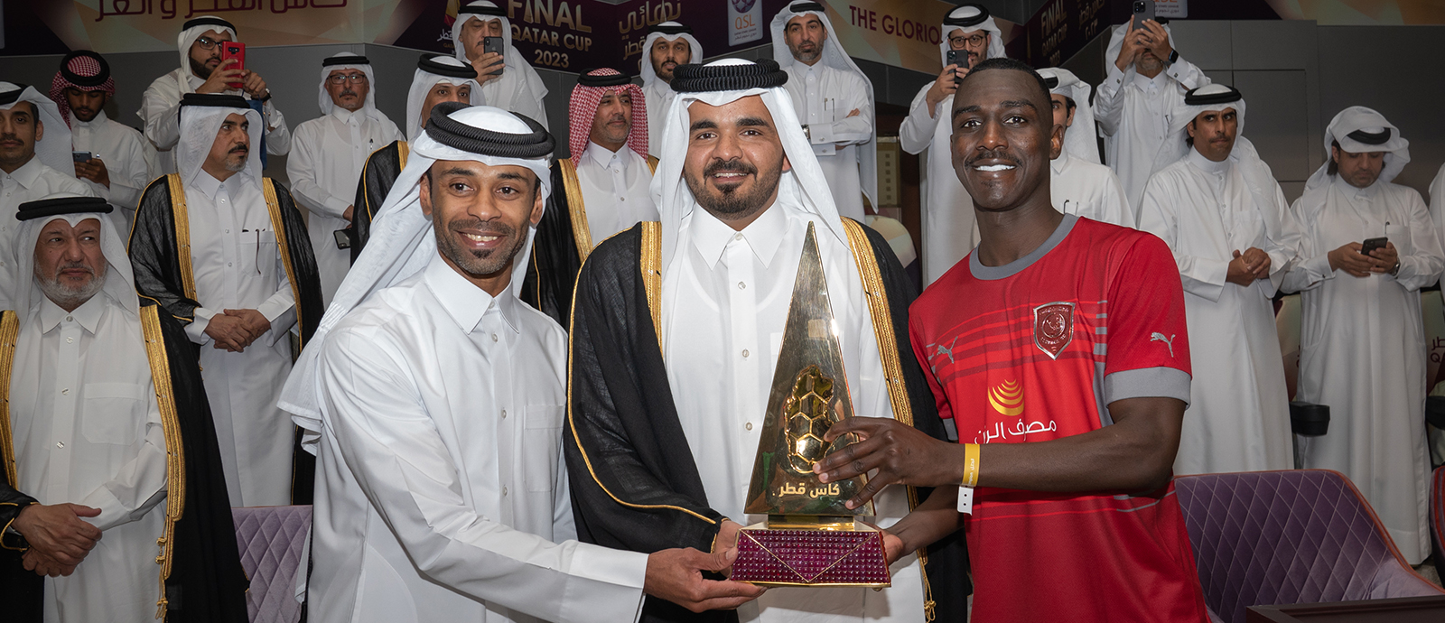 H E Sheikh Joaan bin Hamad Al Thani hands the trophy to Al Moeez Ali 